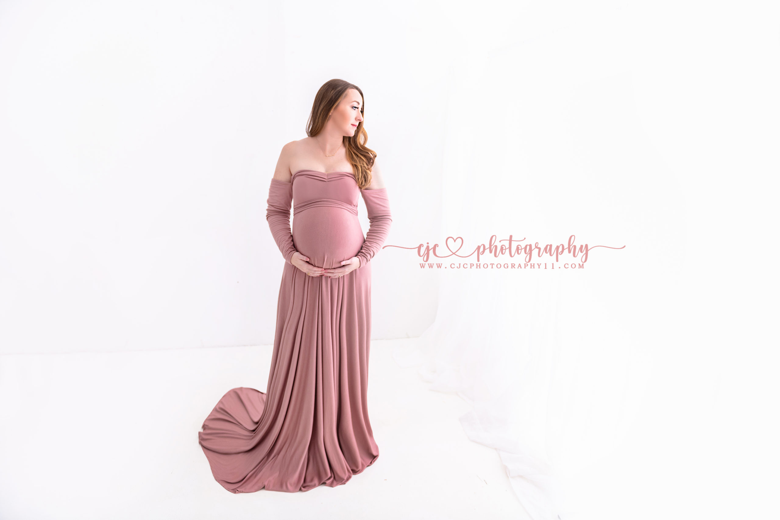 expecting mom in blush gown